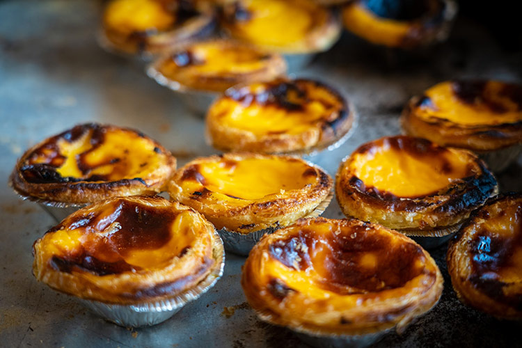 portuguese tarts with sugar on top
