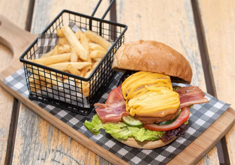 burger-and-fries burger and fries sitting on a table from the origin tales