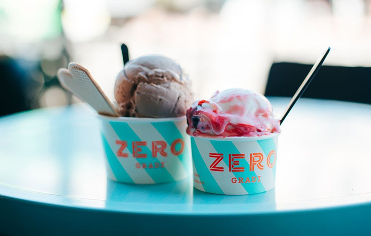 zero-gradi-ice-cream two cups of ice cream with spoons coming out of it from zero gradi